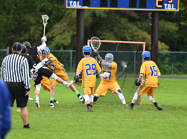 Noah Williams shoots on goal during Harwood's 14-8 D2 semi-final win over Milton. Photo: John Williams